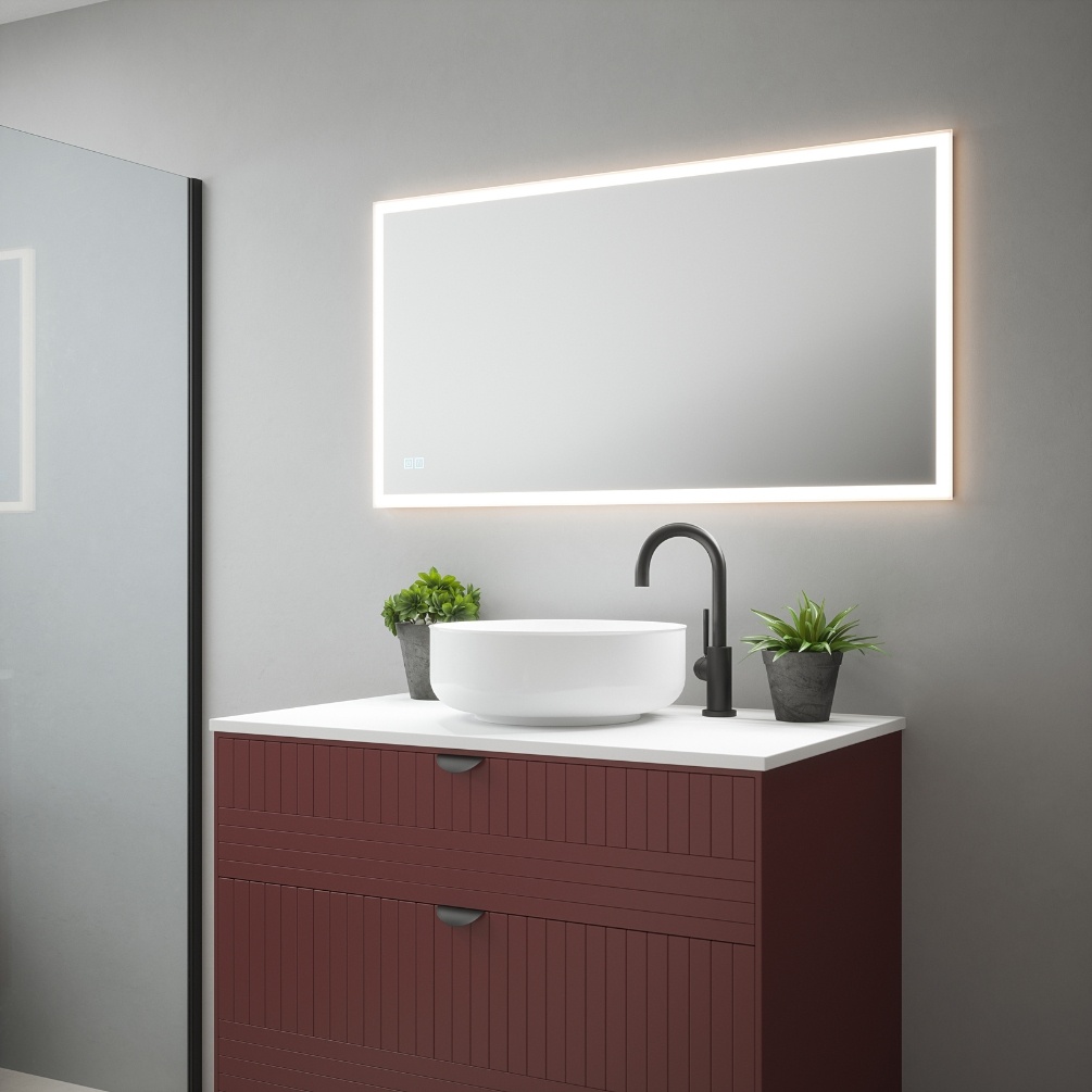 Product Lifestyle image of the Soho 1150mm Colour Changing LED Mirror mounted in landscape